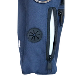 A close-up image of a dog walking bag with a built-in poo bag dispenser