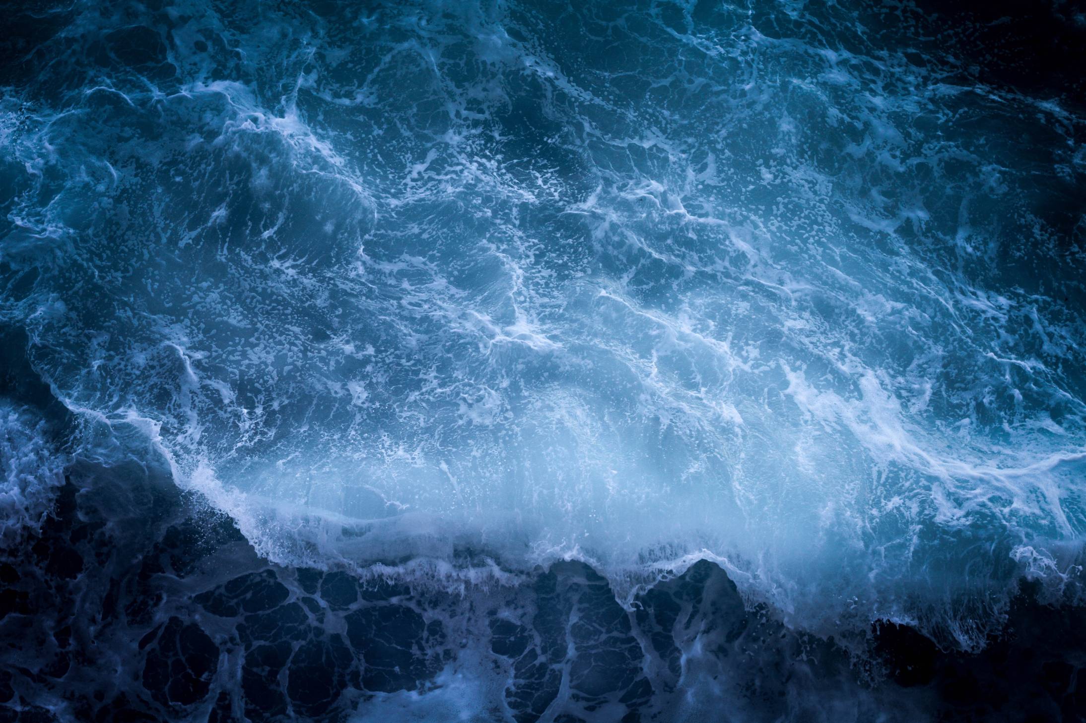 A photograph of waves crashing