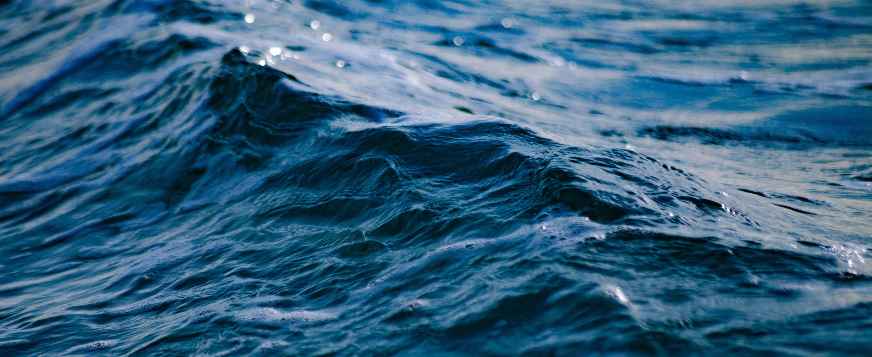 A close-up shot of water rippling in the ocean